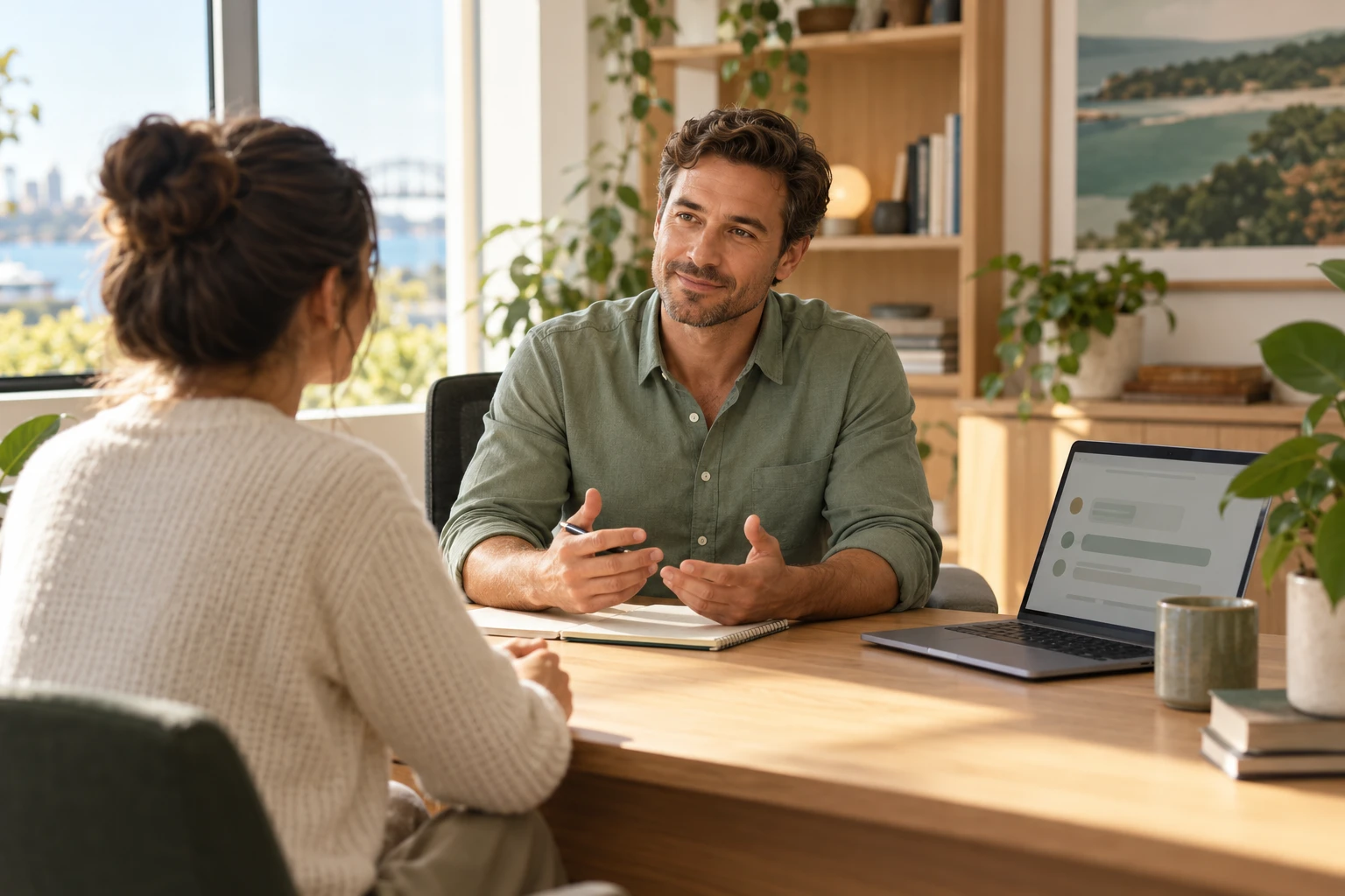 Illustrative support professional listening to a visitor during a personal handover